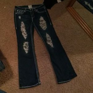 LA Idol ripped up jeans